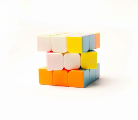 “뇌 건강 지키기, 일상 속 작은 변화에서 시작하세요” a stack of colorful blocks sitting on top of each other